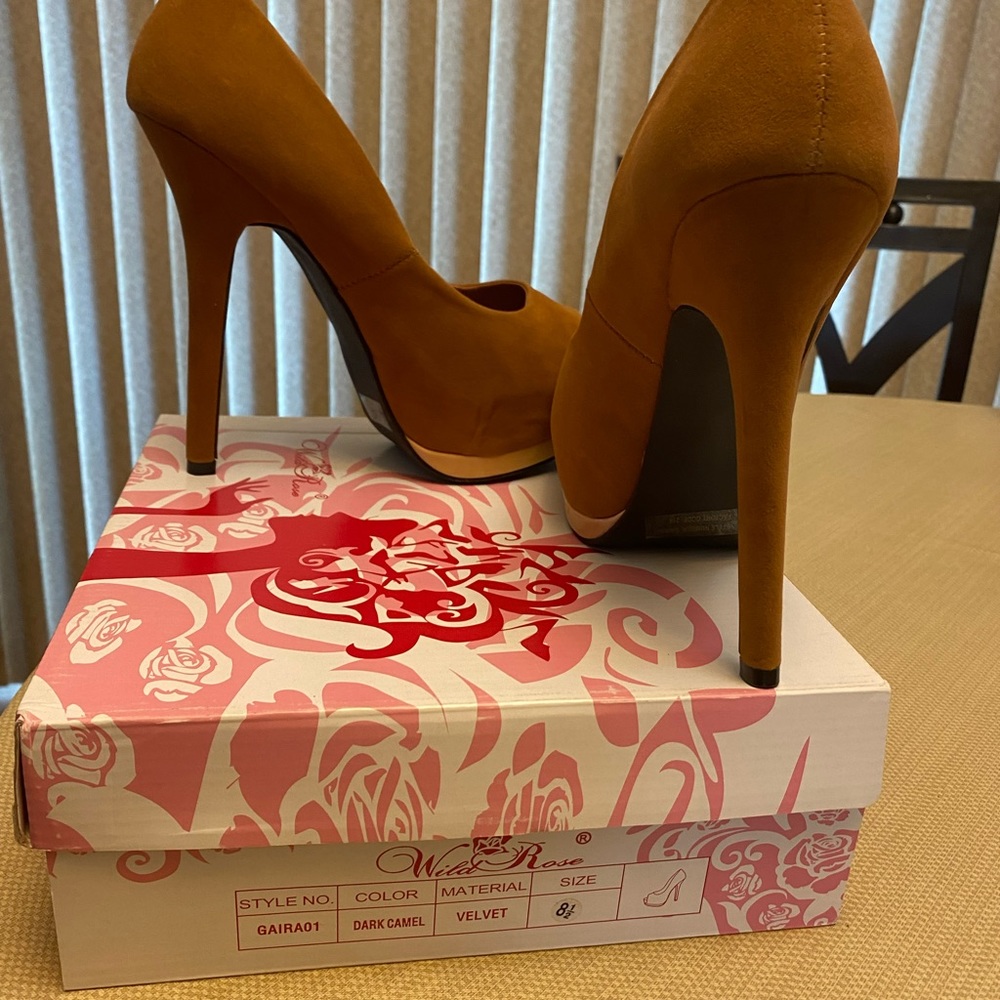 Stiletto heels with open toe.